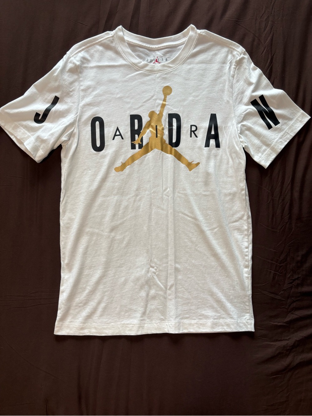 Jordan White Short-Sleeve Tee with Gold Jumpman and Black Lettering